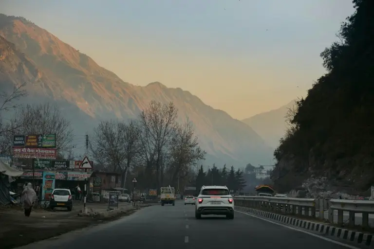 Road journey through Himachal mountain valleys for North India holiday planning